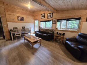 Interior photo of a fishing lodge common area for lounging